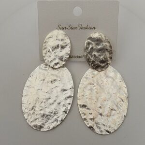 Beautiful silver-tone metal hammered disc dangle stud earrings.